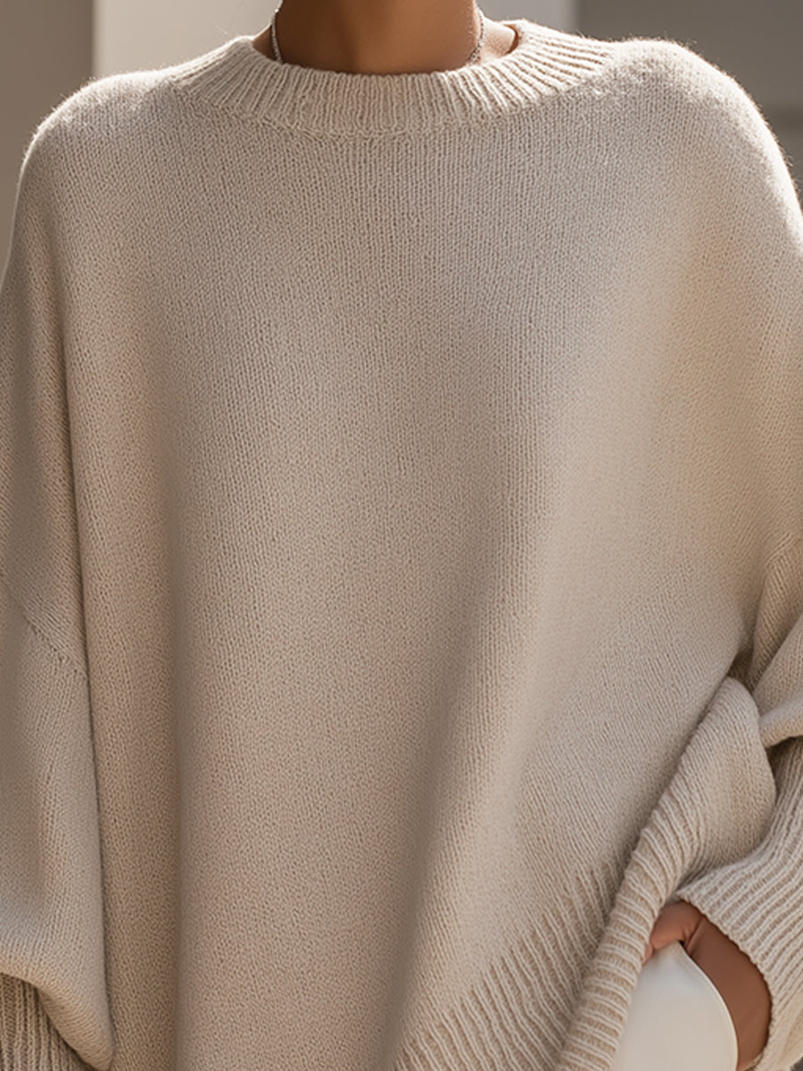 Evelyne – Elegant jumper with an asymmetrical hem